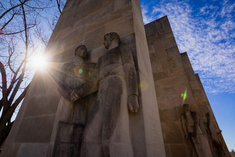 Sun peeking from behind the Pylons at Virginia tech